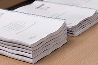 Impressão de apostilas A4 encadernadas